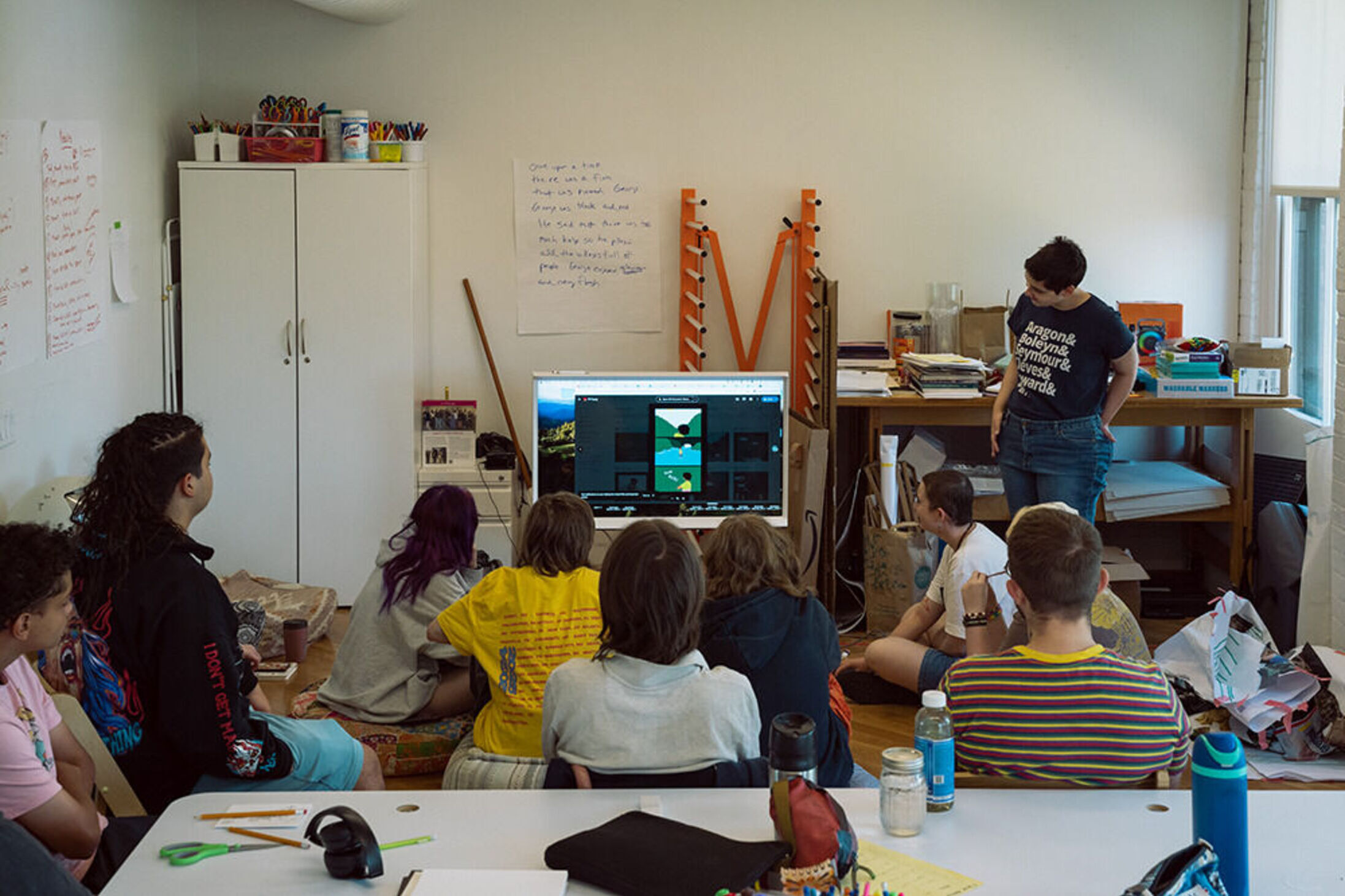 students watching video