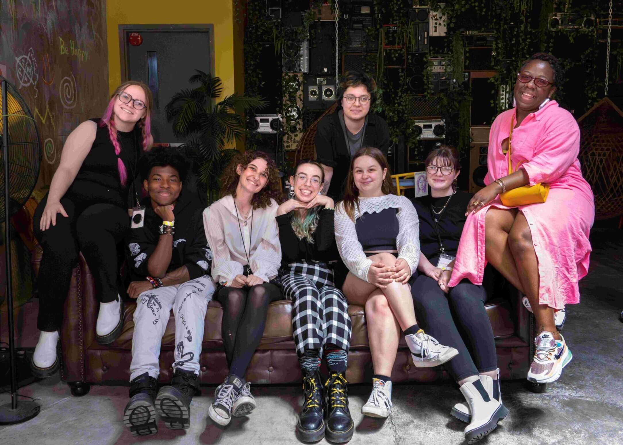 Artists sitting on a couch